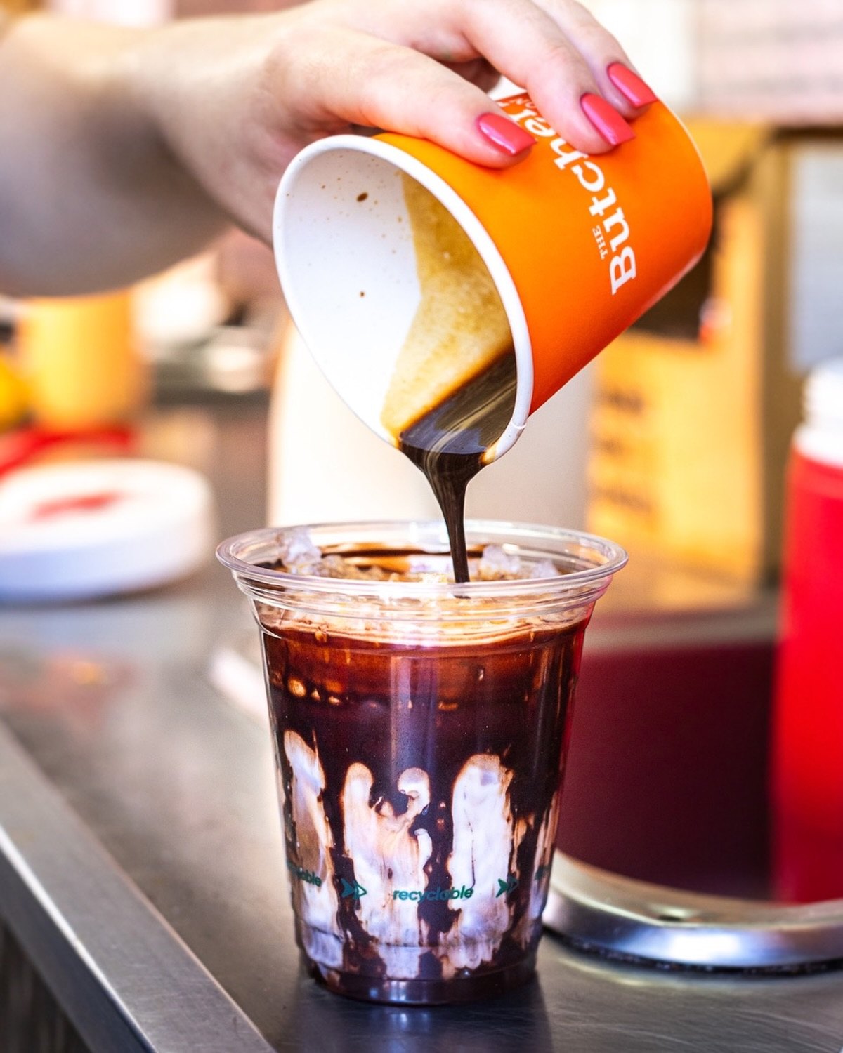 Iced coffee being poured at The Butcher's Apron